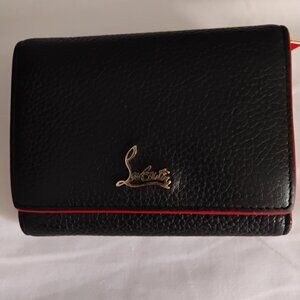 Authentic Christian louboutin black and red wallet.